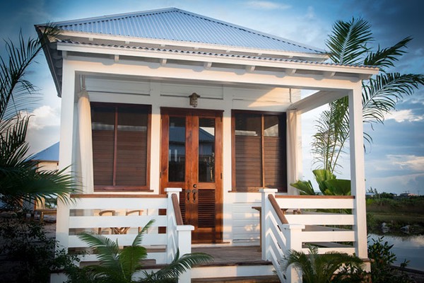 front porch of Guest Cottage welcomes guests at Mahogany Bay Village